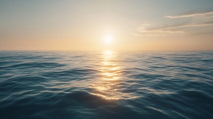 Obraz premium Serene ocean view at sunset, reflecting warm colors on gentle waves.