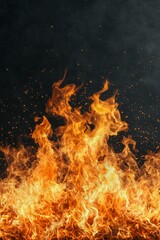 Fototapeta premium Dancing Flames of Intense Heat on Dark Canvas - Fiery Abstract Closeup for Power Concepts and Energy Designs