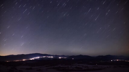 Spectacular Star Trails Over Mountain Landscape - Powered by Adobe