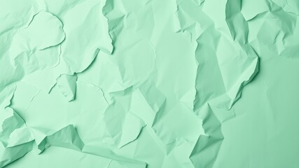 Obraz premium Abstract background with crumpled green paper texture, perfect for minimalist design projects, branding, or as a backdrop for creative concepts.