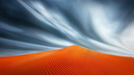  A desert with a cloud-filled sky and blue clouds above a sand dune