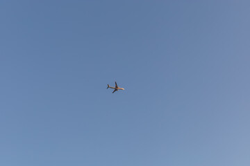 Large airliner in a blue cloudless sky