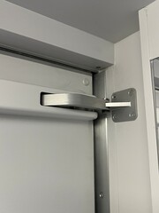 Metal hinge on a door