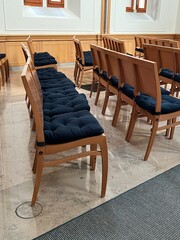 Rows of wooden chairs
