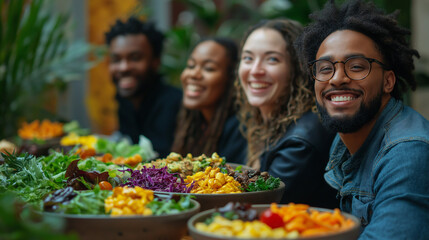 A diverse group of coworkers smiling and enjoying a plant-based lunch with colorful salads and dishes in a vibrant setting