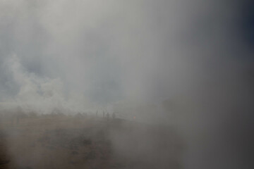 A powerful eruption from a geyser at Geyser Park in Iceland, showcasing geothermal energy, ecology,