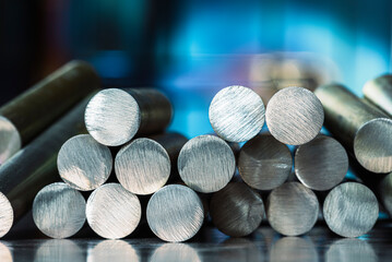 Stack of steel rods in a factory, a product of the metallurgical industry
