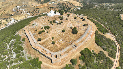 Aerial drone photo of archaeological site of the Mycenaean Citadel and chapel of Agios Andreas...
