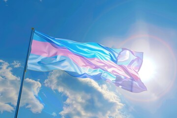 Transgender flag waving against blue sky  transgender pride flag in a street