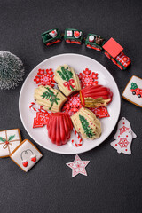 Sweet Madeleines desserts covered with chocolate in Christmas colors