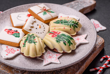 Sweet Madeleines desserts covered with chocolate in Christmas colors