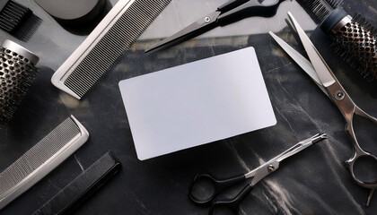 Business card mock up for a hair stylist arranged on a marble countertop with scissors and styling tools