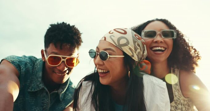 Portrait, people and dancing on beach outdoor for energy, playful and summer vacation of travel reunion. Below, friends and laugh with movement, holiday fun and bonding together of tropical gathering