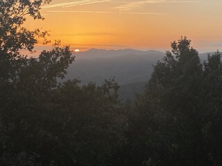 sunrise landscape with orange sky on the top of a mount in Girona, Catalonia