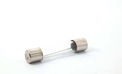 A tube fuse on a white background. A safety component in a vehicle's electrical system that is...