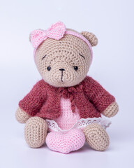 Handmade crocheted bear toy, amigurumi. Handmade stuffed toys. 