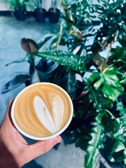 person with cup of coffee