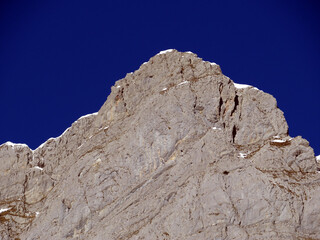 Steep rocky peaks of the Churfirsten mountain range, above Lake Walensee and the Swiss town of Walenstadtberg (Die steilen Felsgipfel der Churfirstengruppe oberhalb des Walensees, Schweiz)