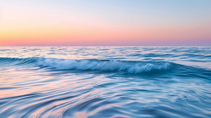 Fototapeta premium Sunrise Reflected in Ocean: The soft pastel hues of a sunrise reflected in calm ocean waters, creating a serene and picturesque morning scene.