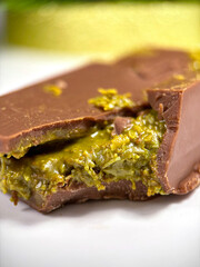 Macro photo of Dubai chocolate with pistachio paste and kataifi dough