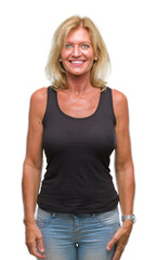 Obraz premium Middle age blonde woman over isolated background with a happy and cool smile on face. Lucky person.