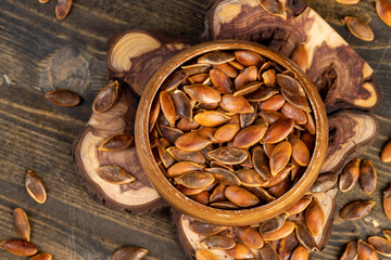 , overcooked or burnt pumpkin seeds on the table