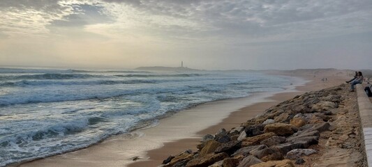 Big wave Saturday at Playa Caños de Meca Beach, Spain, ocean spray creating a cover of mist...