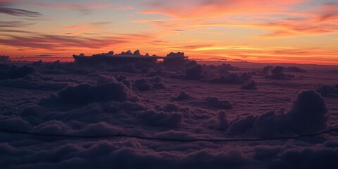 Vibrant hues of pink, orange, and purple streak across the sky at sunset, creating a dazzling display of color and light, clouds, scenery