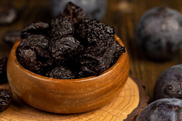 ripe purple plums and dried plums