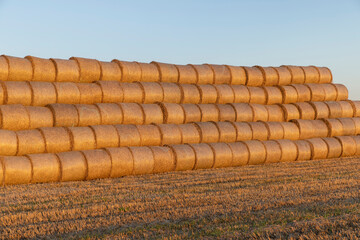 orange stacks from the sun during sunset at dusk