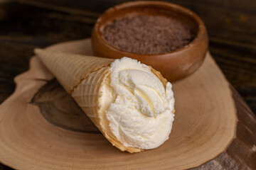 creamy white ice cream with chocolate pieces on the table