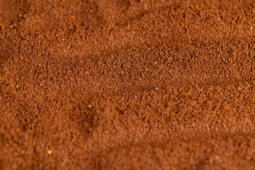 a large amount of ground coffee powder close-up