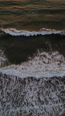 This amazing drone picture of the sunrise over the Black Sea in Romania captures the perfect moment when the first light of day touches the calm waters.