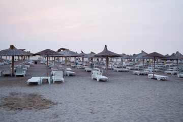 An amazing sunrise at the Black Sea in Romania, with calm, gentle waves, creates a peaceful and serene atmosphere.