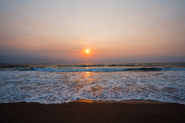 An amazing sunrise over the Black Sea in Eforie, Romania, offers a breathtaking sight as the sun begins to rise over the horizon.