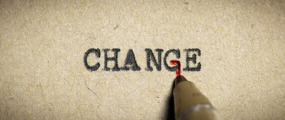 Pen With Red Ink Changing The Word 