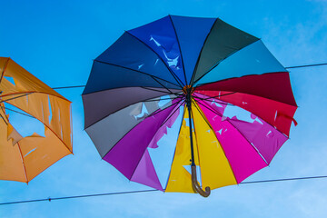 Torn umprellas in the street of Nitra