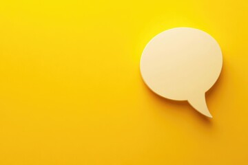 Isolated Speech Bubble on Bright Yellow: A Vibrant Representation of Discussion and Idea Sharing