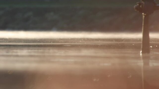 fog and light mist on the surface of the river adda