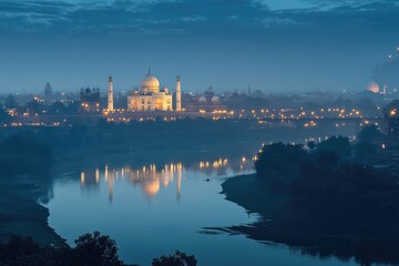 Naklejka premium Majestic Taj Mahal Bathed in Sunrise Glow over Agra, India - A Stunning Architectural Marvel by the River