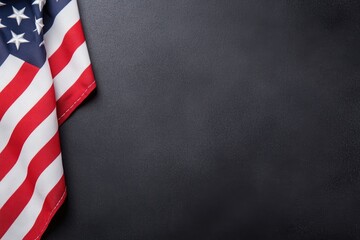 Fototapeta premium Photo of an American flag on a black background, with space for text, representing a USA holiday celebration concept with room for copy.