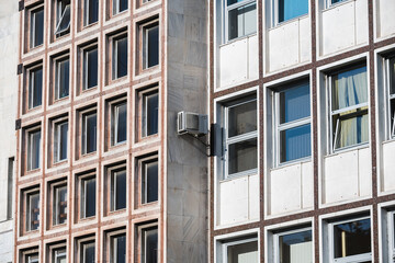 Close-up of windows on a sunlit building