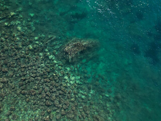 Seabed Through Blue Water - Aerial Drone Shot