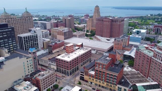 Experience the urban charm of Buffalo, NY, with this stunning aerial drone footage. This clip captures a flight over the downtown area, showcasing the vibrant cityscape and Buffalo City Hall.  