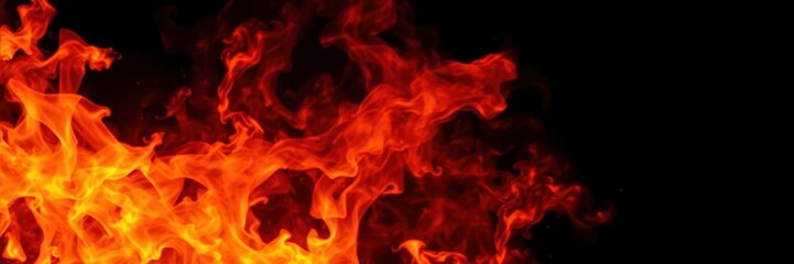 Fototapeta premium Dynamic fire flames engulfing a black background, heatwave, orange