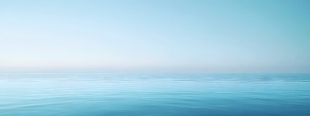 Obraz premium Serene Blue Ocean Under a Tranquil Sky