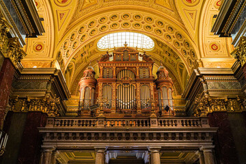 Grand Pipe Organ in an Ornate Basilica Interior