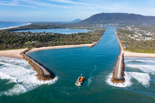 Aerial View North Haven - NSW Australia - Construction Barge leaving the Camden River