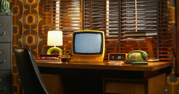 A monitor with ripples on the desktop screen. Retro office, interior details