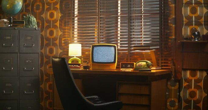 A monitor with ripples on the desktop screen. Retro office, interior details